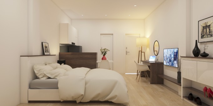 Phía trên đầu giường là chiếc kệ nhỏ dùng để trưng bày những khung tranh nghệ thuật.
