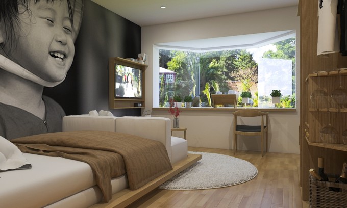 Studio tận dụng được tối đa ánh sáng vào nhà đó bằng cửa sổ kính lớn, giúp ánh sáng tràn vào nhà một cách dễ dàng.
