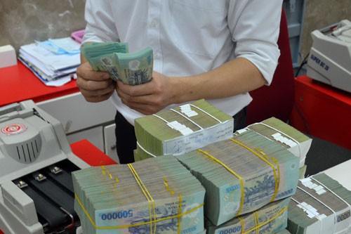Nhiều ngân hàng đã nâng lãi suất tiền gửi lên trên 8%/năm Ảnh: Tấn Thạnh